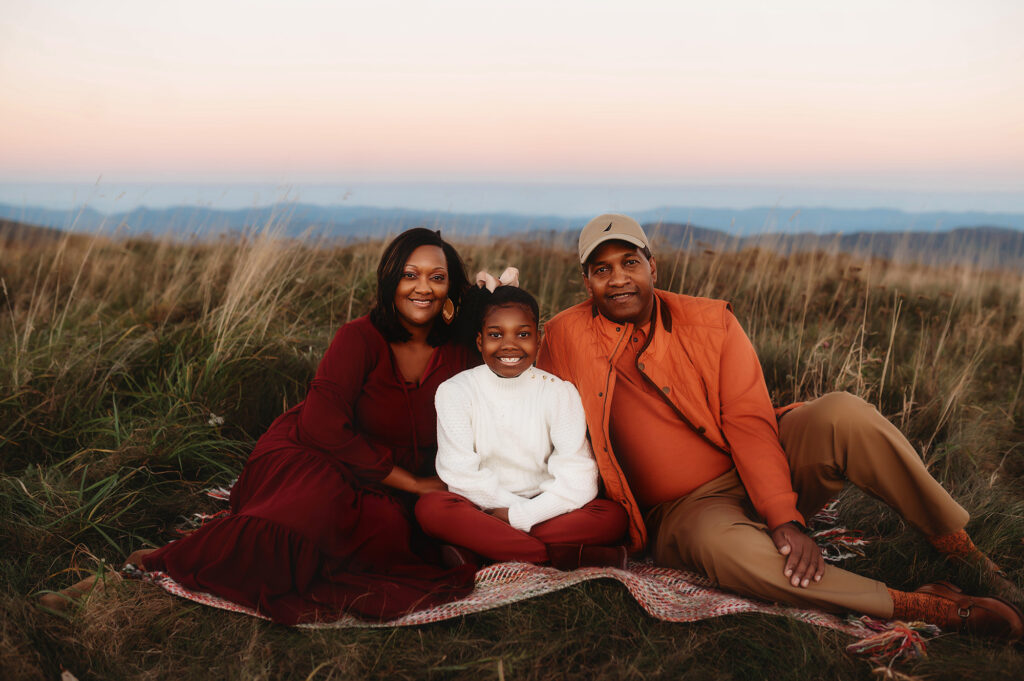 Family embraces during Family Portrait Session at Max Patch.