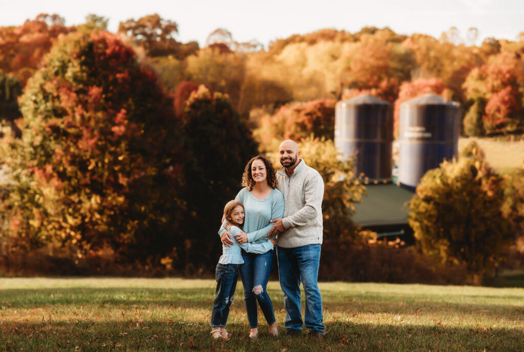 Family poses for Fall Portraits in Asheville after learning about Family Photo Locations in Asheville