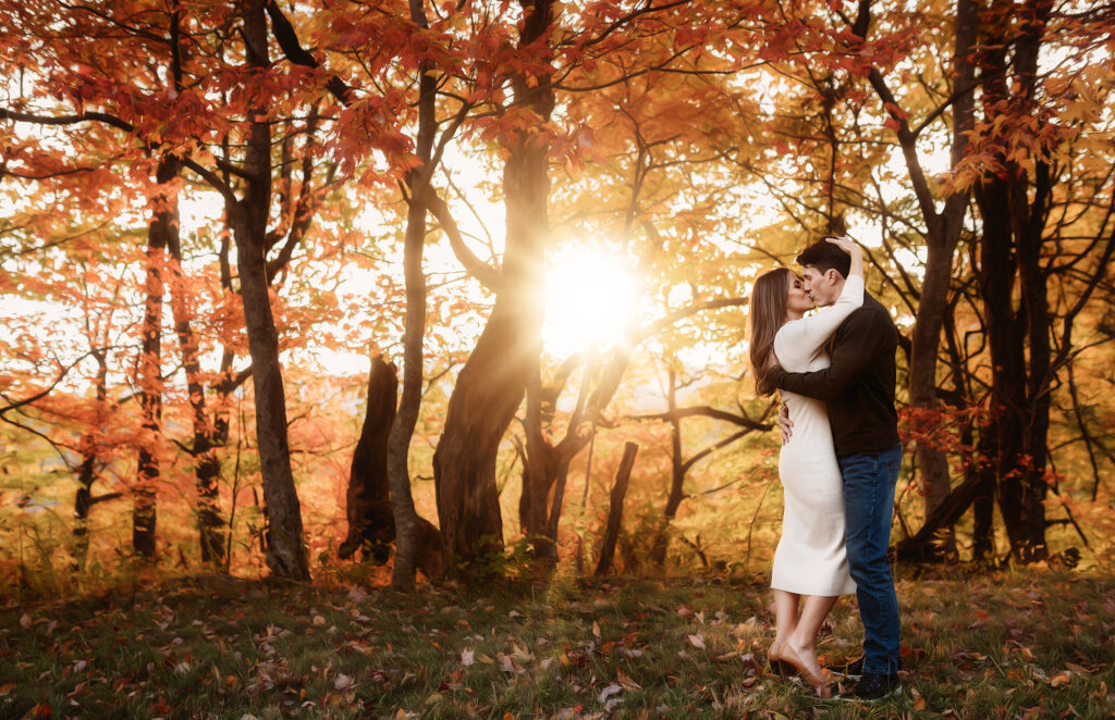 Couple embraces during Family Photos in Asheville, NC.