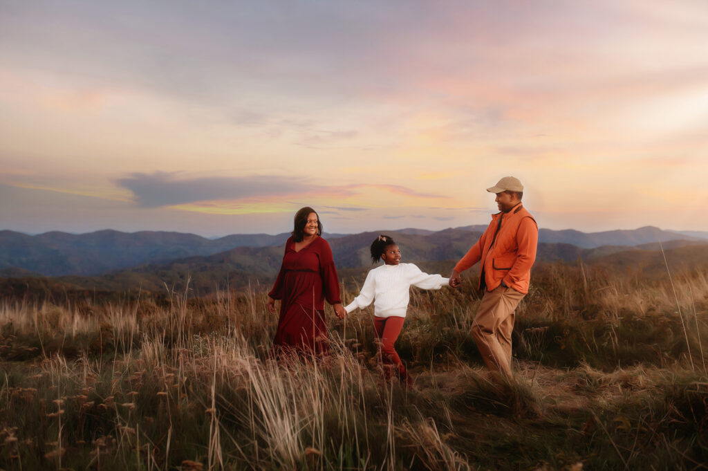 Family walks together during Family Portrait Session at Max Patch.