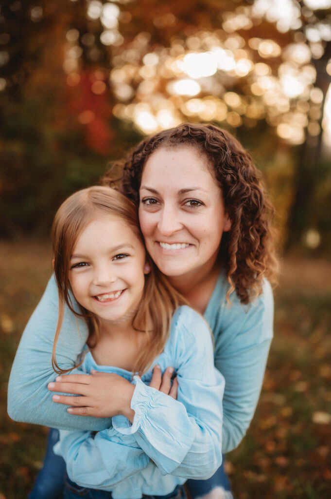 Mother hugs her daughter during Family Portrait Session in Asheville.