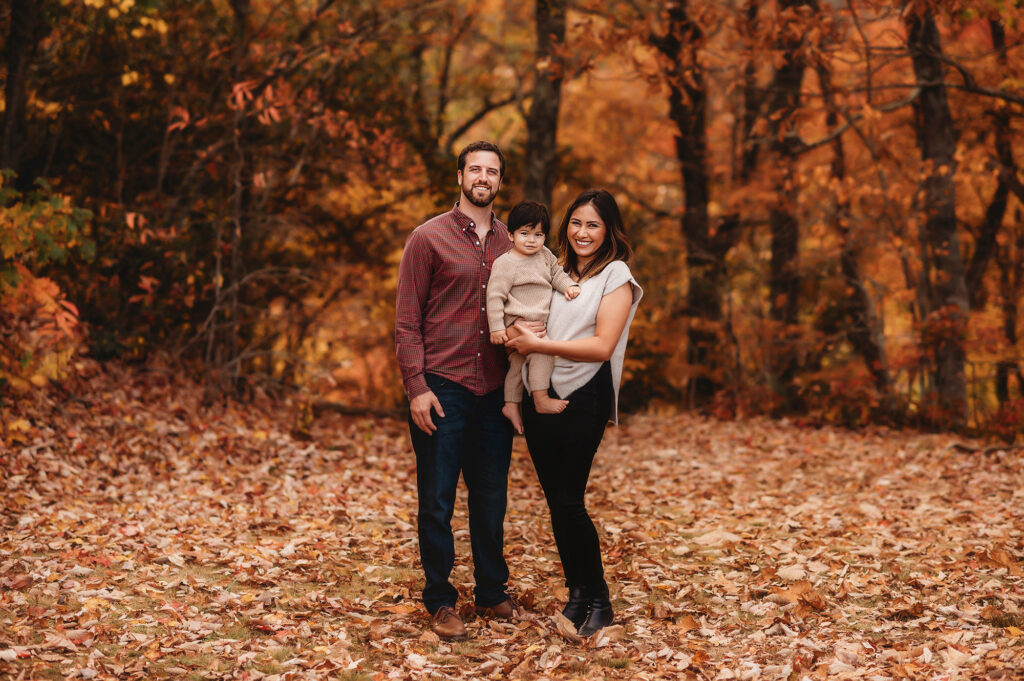 Family poses for portraits during Family Photoshoot on the Blue Ridge Parkway in Asheville, NC.