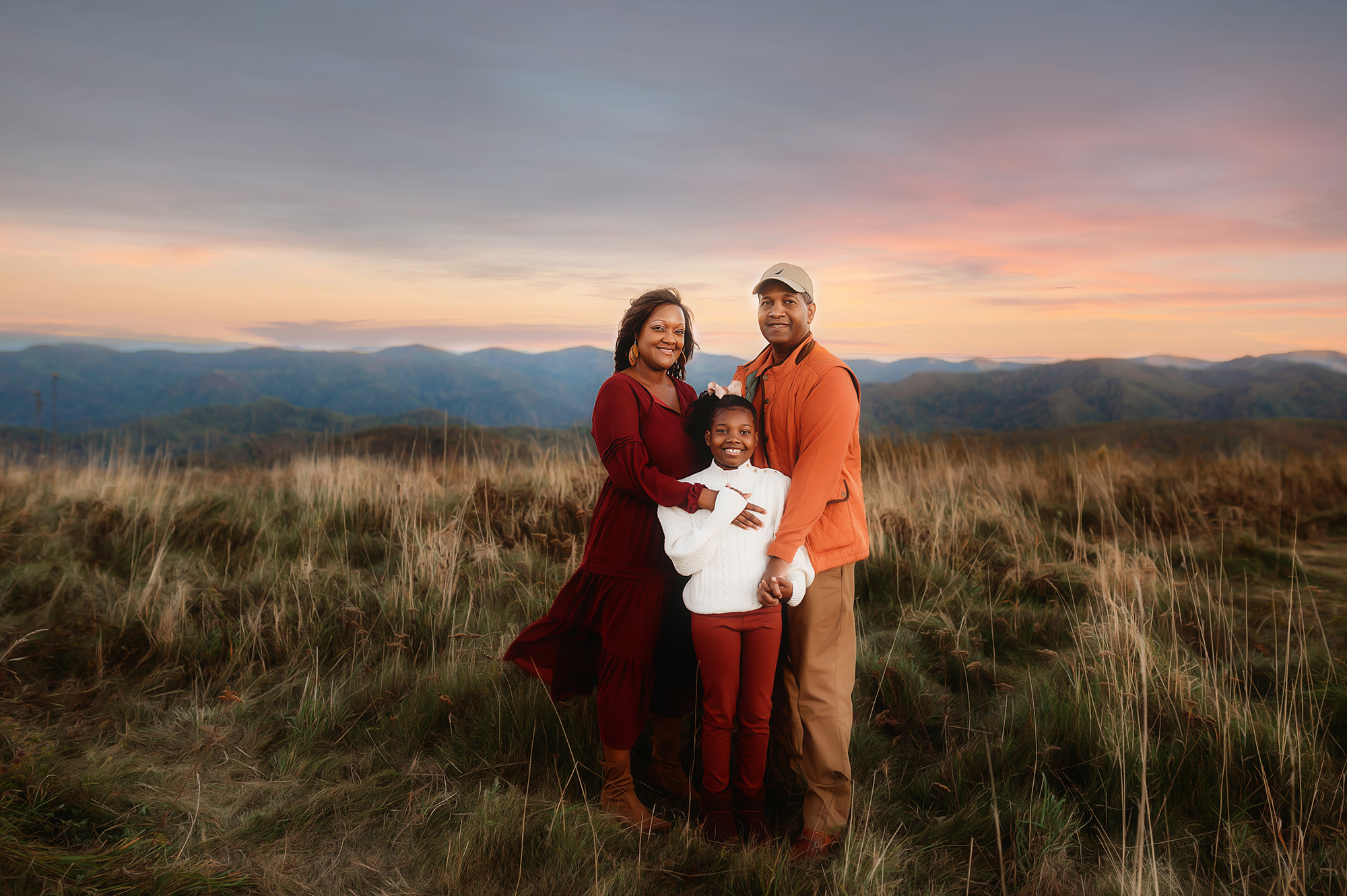 Family poses for Fall Family Photos in Asheville, NC.