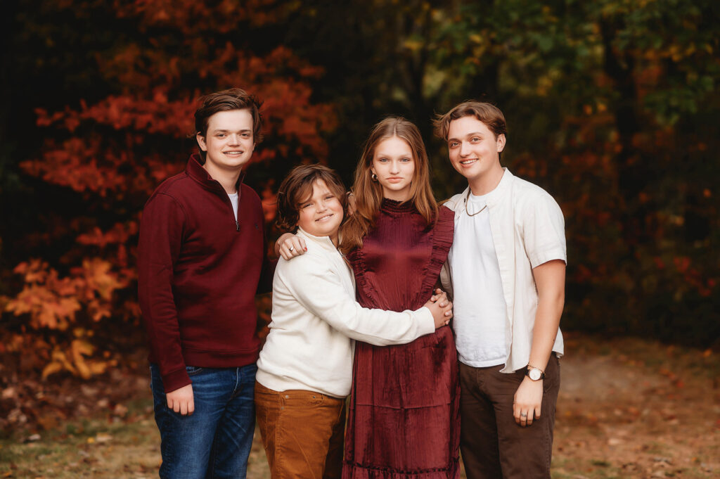 Siblings pose for Family Photos in Asheville, NC.