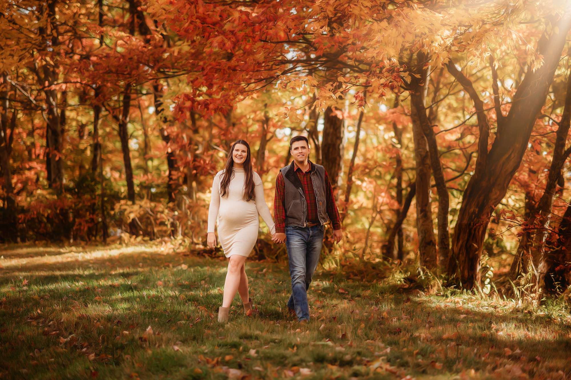 Expectant parents walk along the Blue Ridge Parkway for their Maternity Photoshoot in Asheville, NC.