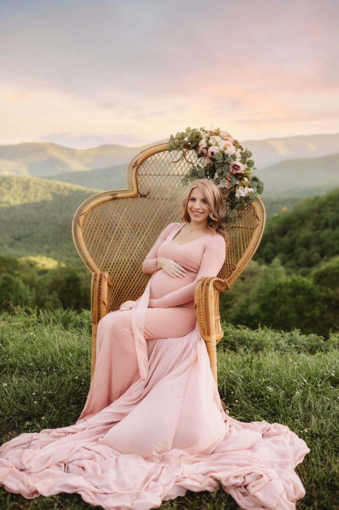 Expectant mother poses for Maternity Photos on the Blue Ridge Parkway after learning about the Best Asheville Pediatricians.