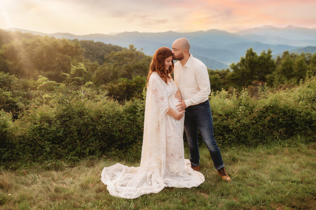 Expectant parents pose for Maternity Photos on the Blue Ridge Parkway in Asheville, NC after learning about the 5 Fun Things Every Pregnant Woman Should Experience in Asheville.