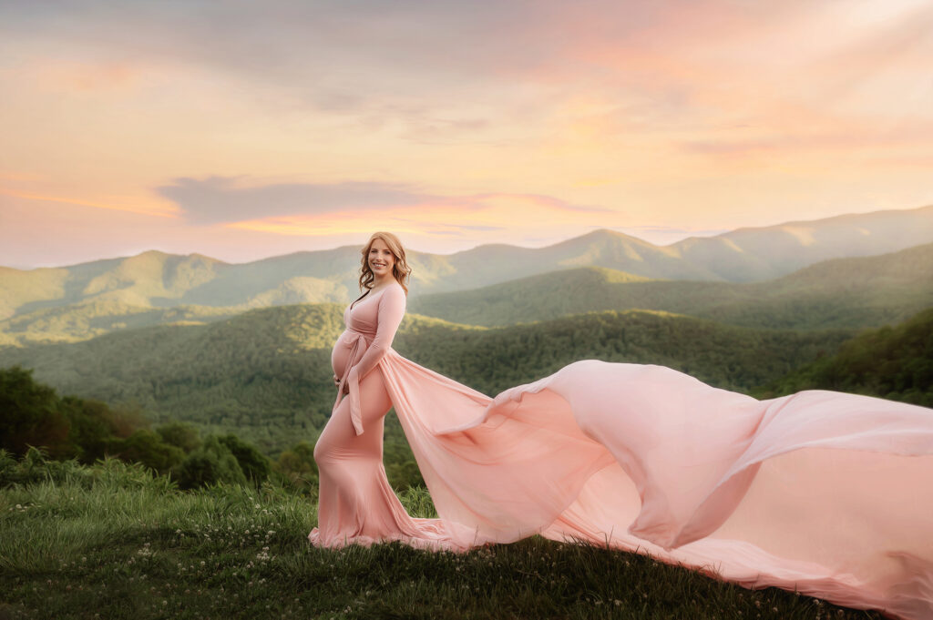 Expectant mother poses for Maternity Photos on the Blue Ridge Parkway after learning about the Best Asheville Pediatricians.