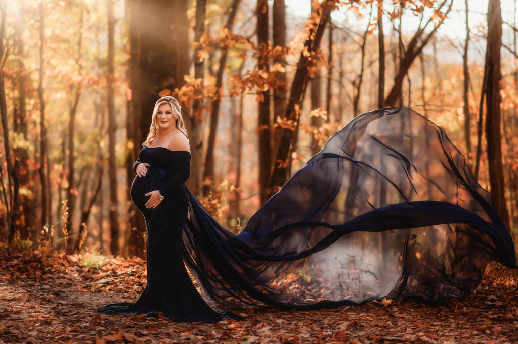 Expectant mother poses for Fall Maternity Photos in Asheville. 