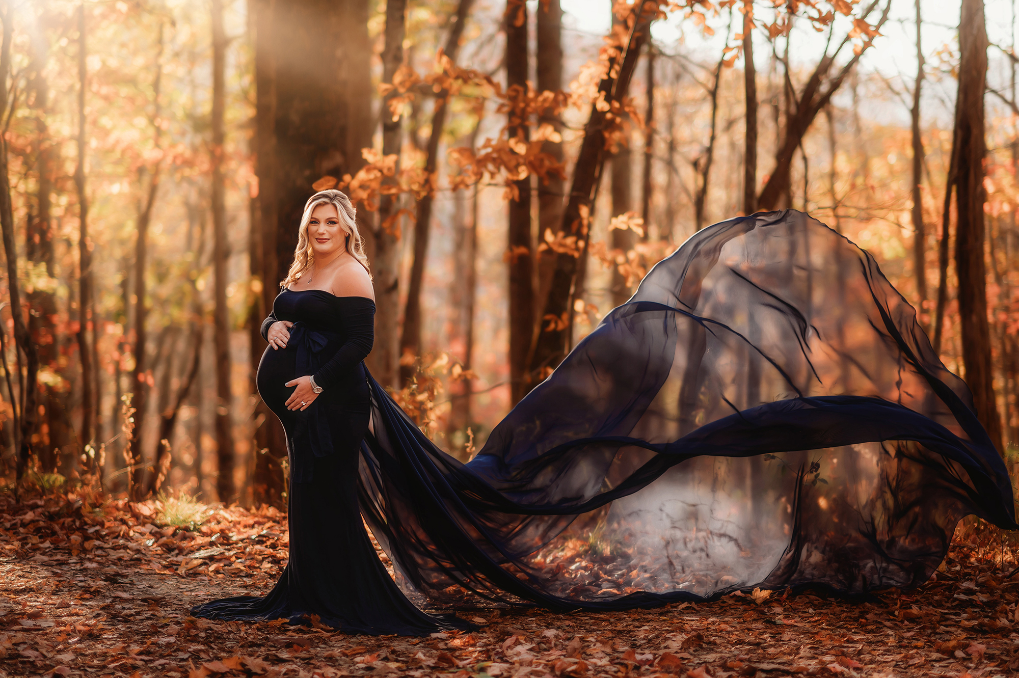 Expectant mother poses for Fall Maternity Photos in Asheville.