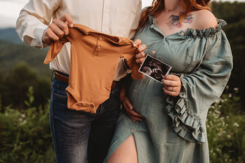 Expectant parents pose for Maternity Photoshoot in Asheville. 