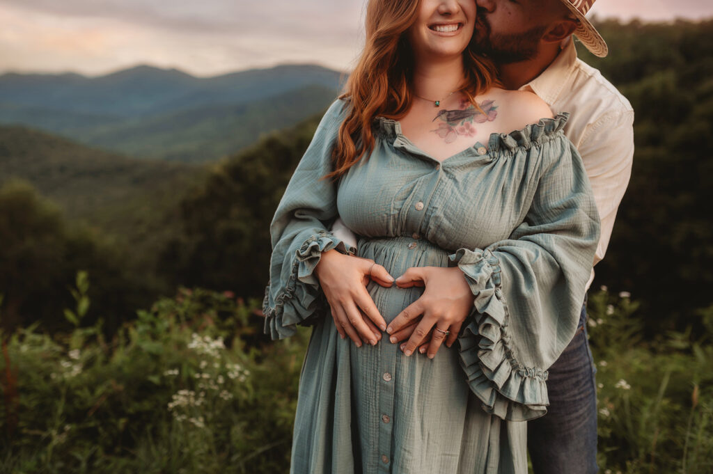 Expectant parents pose for Maternity Photoshoot in Asheville. 