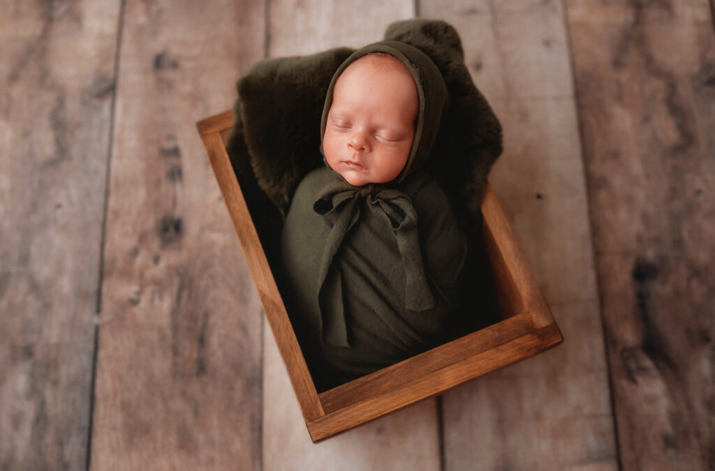 Baby posed for Newborn Photos in Asheville, NC.