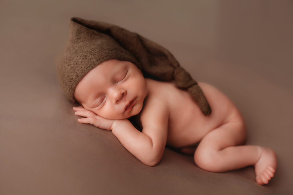 Baby posed for infant photos in Asheville, NC.